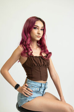 model on white background backdrop modeling catalogue pink hair alternative juniors young woman women girl teenager jean short brown top headshot digitals fashion beautiful young makeup emo colorful 