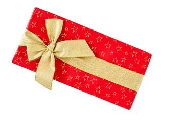 Gift wrapped box of chocolates, red paper with gold stars and wide gold ribbon, ready to celebrate
