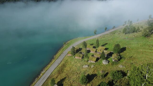 Lovatnet glacier lake and Breng seter historical farm houses. Drone footage. Norway