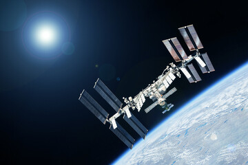 International Space Station above the Earth. Elements of this image furnished by NASA