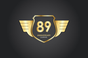 89 years anniversary logotype 3D golden stylized modern shape winged shield on black background