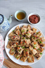 A must have dish for Cantonese celebrating Chinese New Year. Homemade Fried Radish Cake aka Lo Bak Go. Delicious and healthy, a dish that brings good fortune synonym with Chinese beliefs