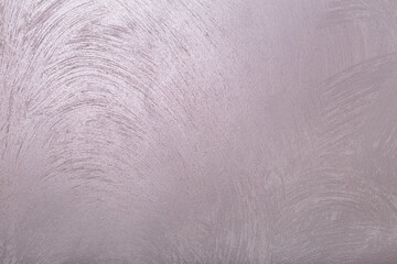 Gradient gray with pearlescent background. Plaster on the wall with patterns. Background, texture, wallpaper.