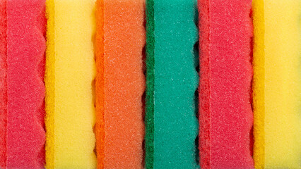 Background of colorful sponges for washing dishes. Colored sponges, background, wallpaper, texture.