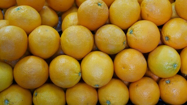 Image of ripe oranges on the counter in supermarket