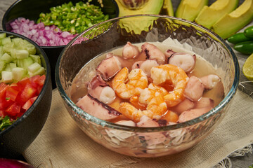 Hand of a person preparing a shrimp broth