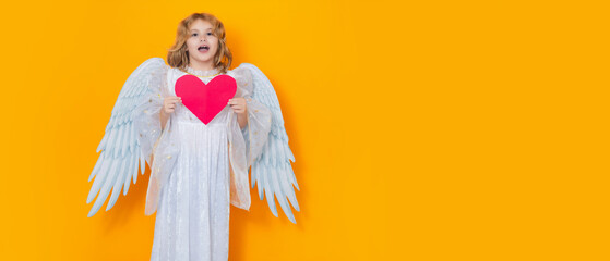 Paper heart, Child with angel wings hold red heart. Heart symbol love and valentines day. Banner header with copy space.