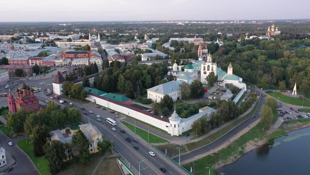 Picturesque summer view of russian town of Yaroslavl with many churches and Kotorosl river at sunset