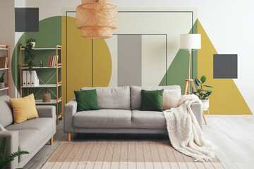 Interior of light living room with sofas and shelving units