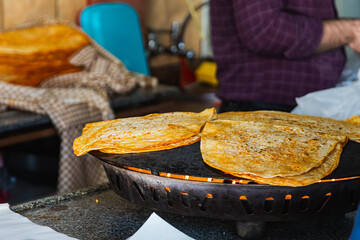 Close-up pita bread is heated for turkish shawarma