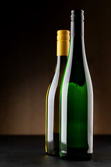 Fototapeta na wymiar White wine bottles