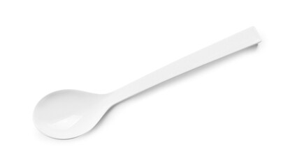 Empty ceramic spoon on white background