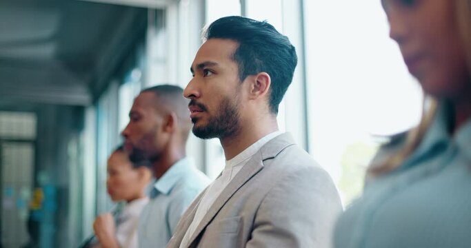 Recruitment, hiring and nervous man waiting for interview, anxiety and panic with group in room. Stress, job opportunity and businessman anxious, worry and overwhelmed before HR meeting for vacancy