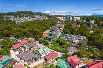 Baguio City, Philippines - Aerial of hotels and residential areas near Mines view park.