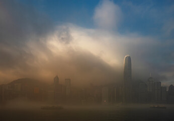 Fototapeta na wymiar Scenery of Victoria Harbour of Hong Kong city in fog