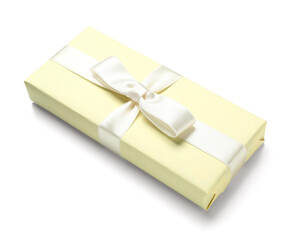 Gift box tied with ribbon on white background. Women's Day celebration