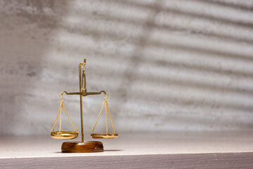 Law and justice concept. Mallet gavel of the judge, scales of justice, books. Copy space for text