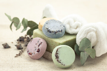 Close-up, multicolored handmade soap on a blurred background.