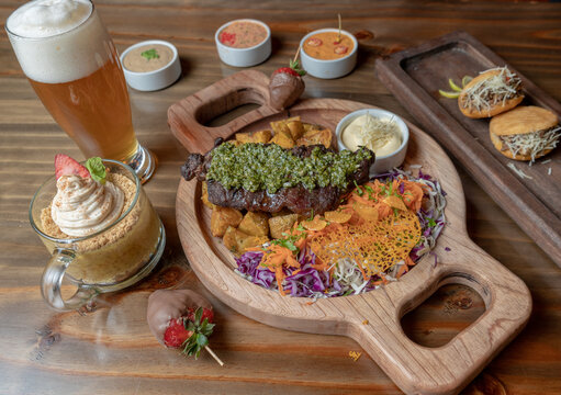 table of meat and grilled achuras