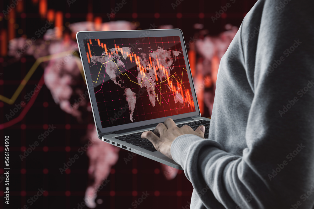 Poster close up of hand using laptop with falling red forex hologram on blurry background. stock crisis pri