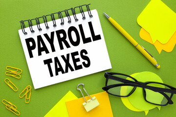 payroll taxes . Conceptual background with chart ,papers and pen - obrazy, fototapety, plakaty