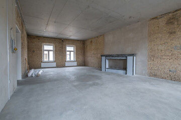 empty interior in house without repair with white silicate brick walls