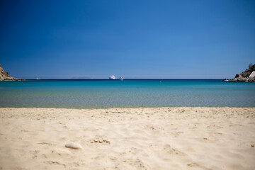 Fototapeta na wymiar Panoramic view of the white stunning turquoise sandy beach of Kolitsani View in Ios Cyclades Greece