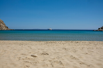 Panoramic view of the white stunning turquoise sandy beach of Kolitsani View in Ios Cyclades Greece
