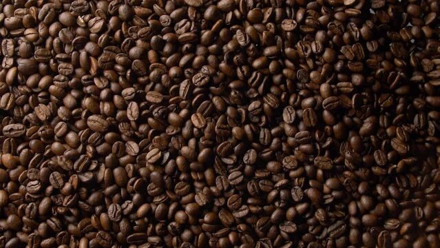 Сoffee beans in motion rise up