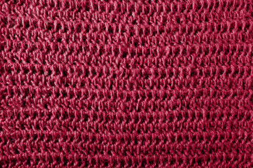 Background knitted cloth made of jute thread. Close-up, top view