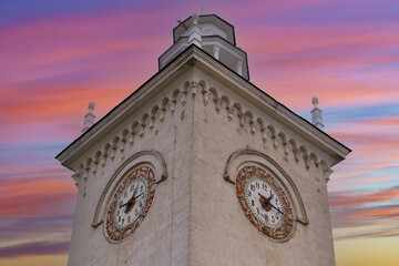 Landscape with a view of the old clock on the tower of the railway station.