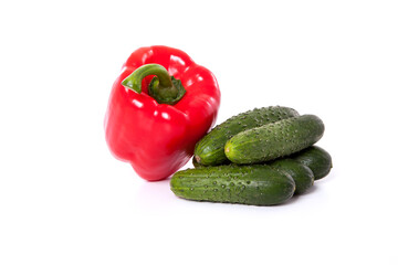 Cucumber and red pepper on the white background