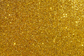 Golden glitter texture as background
