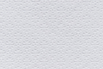 A sheet of white structured white tissue paper as background