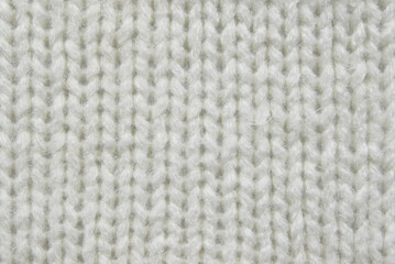 White soft knitted fabric texture as background
