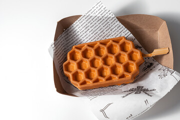 Waffles on a white table. Fresh waffles breakfast, snack on white background
