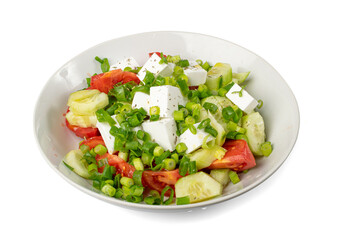 Greek Salad Isolated, Horiatiki Salat with Tomatoes, Cucumbers, Onion, Feta Cheese in White Bowl