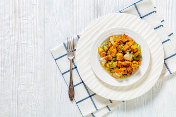 turkey pot pie with stuffing crust on plate