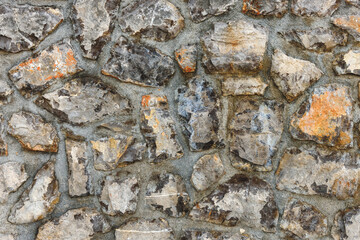 Old stone wall in croatian town of Opatija as background