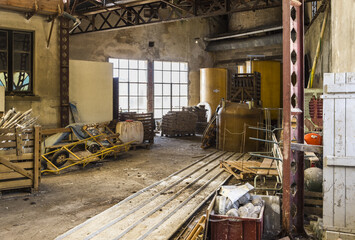 Fototapeta na wymiar Inside an abandoned warehouse