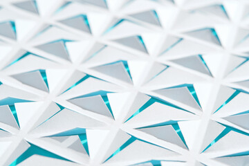 Geometric abstract background. Paper with triangular cuts.