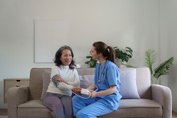 Home healthcare nurse, physical therapy with senior adult woman at home