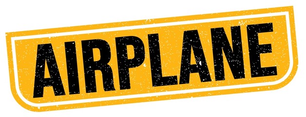 AIRPLANE text written on yellow-black stamp sign.
