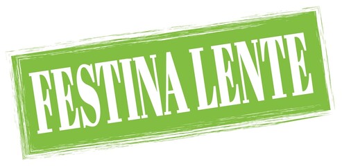 FESTINA LENTE text written on green stamp sign.