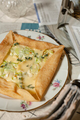 crepe desserts with cheese on the table