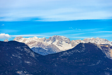 Mountain range and peaks of Brenta Dolomites (Dolomiti di Brenta, Adamello Brenta National Park) view from the Baldo Mountain (Monte Baldo), Nago-Torbole, Trento province, Trentino Alto Adige, Italy.