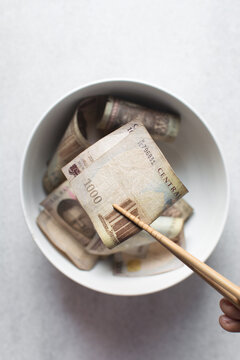 Eating Money With Chopsticks, Eating Nigerian 1000 Naira Notes With Chopsticks