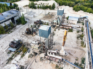 Aerial view of a devastated and neglected dry mortar plant.