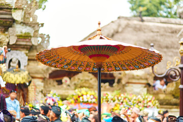 Rite of cremation of the royal family on the island of Bali. Topla people carry the throne with the...