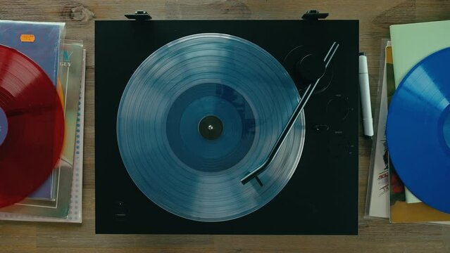 Top Down Symmetric Shot Of Stylish Vintage Record Player On Wooden Table. Analog Retro Vinyl Play Music Recording On Turntable